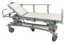 Elektriski, augstumā regulējami pacientu transporta rati ar rentgenstaru caurlaidīgu virsmu